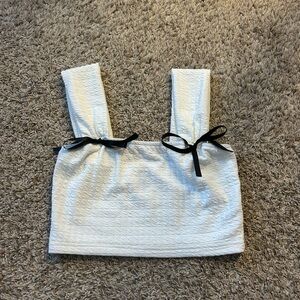 white tank top with black bows